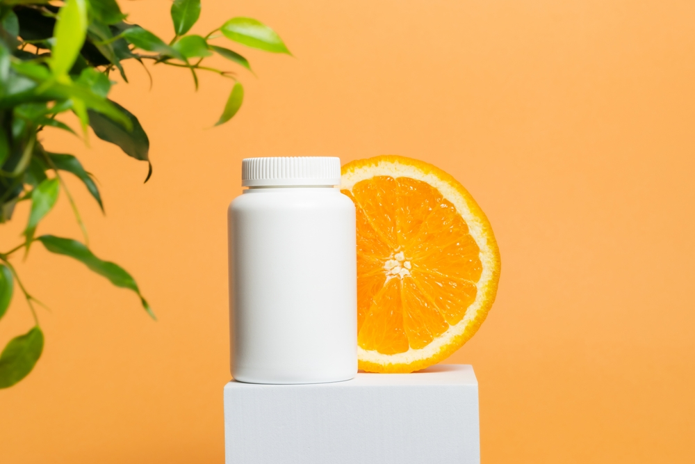 vitamin bottle with orange slice