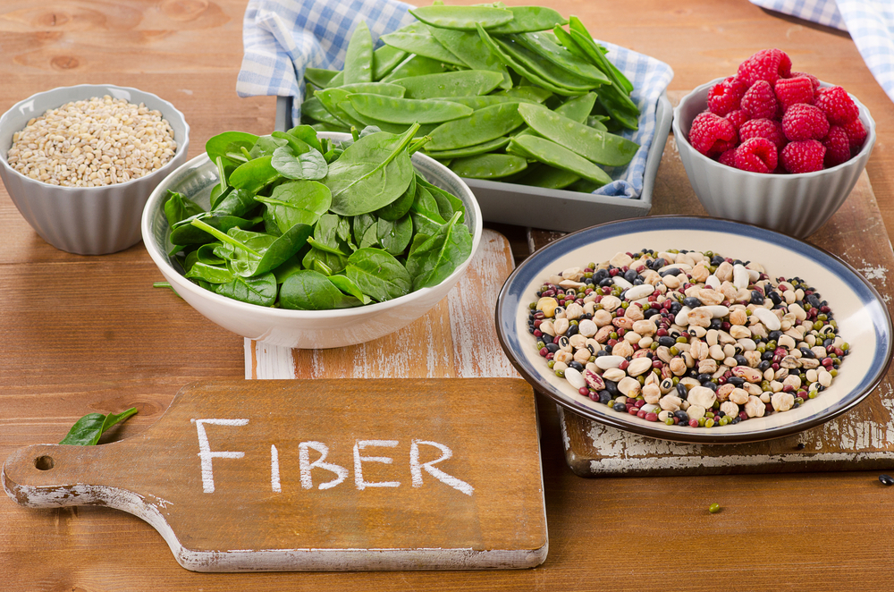 Fiber-rich foods like spinach and grains